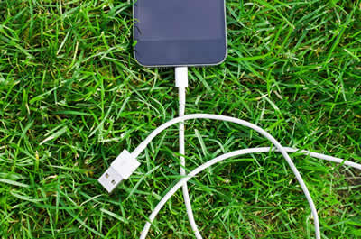 USB C type cable connected to an iPhone